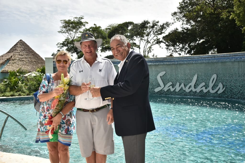 Sandals Royal Barbados (Loggerhead Block) first guests Mr. and Mrs. Howard (MaryWilliam)having a celebratory glass of champagne with Resort Manager Mr. Patrick Drake.
