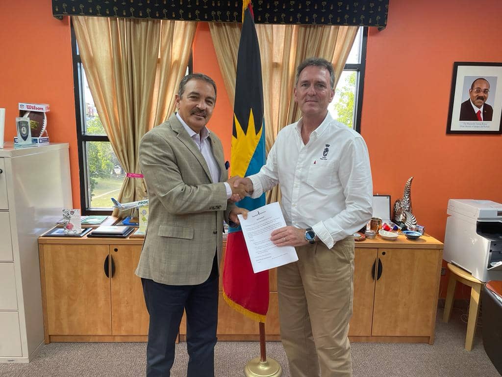 Antigua and Barbuda Minister of Tourism, The Hon. Charles Fernandez shakes hands after RORC agreement signing with RORC 600 CEO Jeremy Wilton