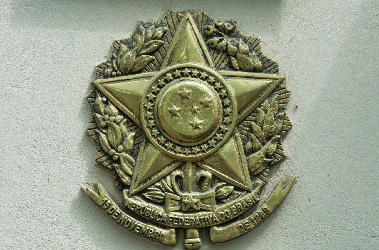 the badge with the symbol of Brazil in front of entrance of Brazilian Embassy in Slovenia.