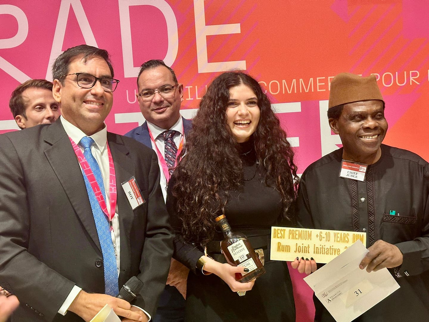 Ms Aya Raphael recieving the award in the name of the Mission