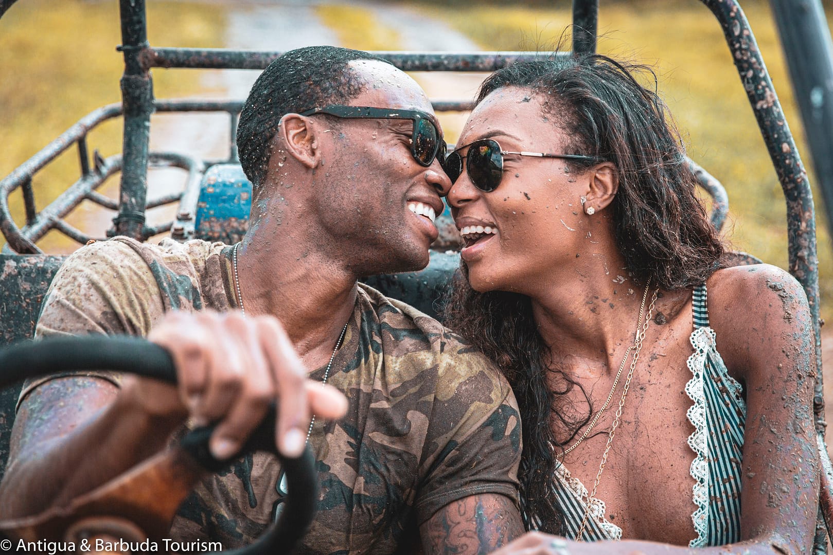 Afiya and Lloyd enjoy a laugh while off-road buggying in Antigua with 268buggies