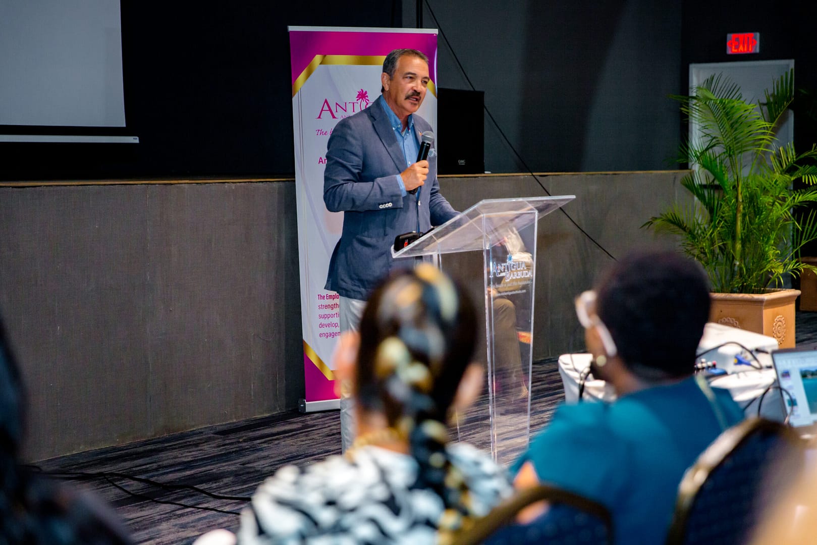 Hon. Charles Max Fernandez presenting at the Tourism Marketing Strategy Meeting