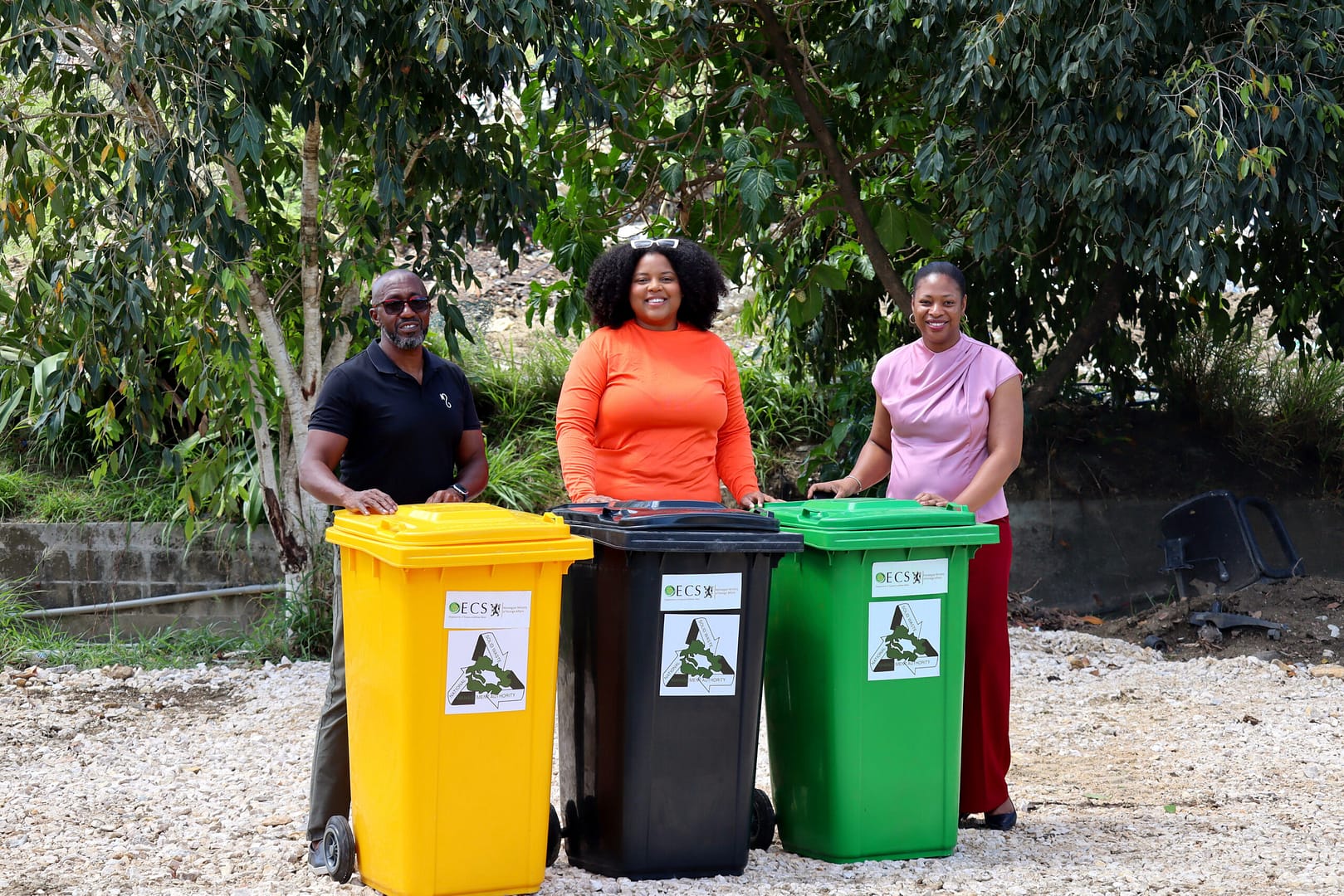 (From Left To Right) FCRA Chairman Clement Samuel, SWM Project Manager Britney McDonald, NSWMA General Manager Indira James-Henry