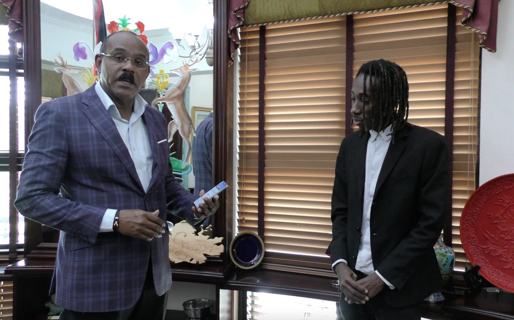 Prime Minister and PayServ CEO Sherwin Jupiter