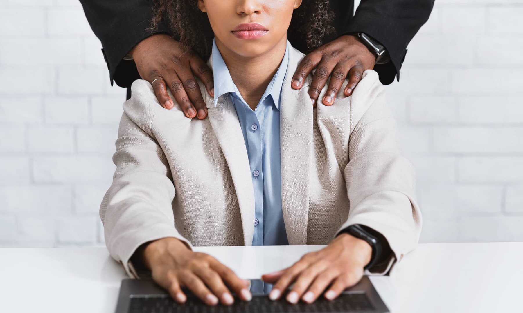 Sexual harassment problem. Close up of boss touching his beautiful female assistant at workplace, panorama