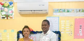 [L-R] Principal for the School of the Deaf Dianne Archibald and Sandals Public Relations Manager Leon Norville.