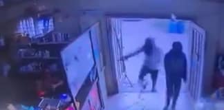 VIDEO: 2 armed masked men rob Villa business