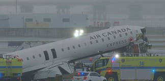 2 killed, dozens injured after Air Canada flight hits fire truck on runway at LaGuardia Airport