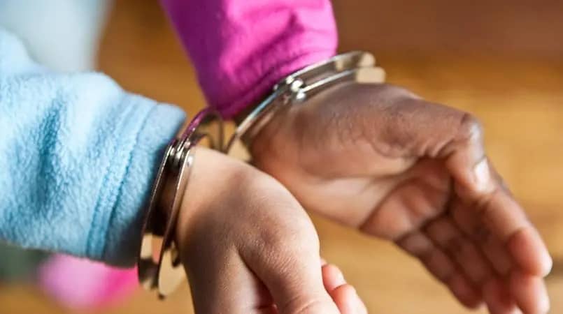 woman_in_handcuffs_stock_photo_23d2633cec000e98a231e3ef11b3aec7 (1)
