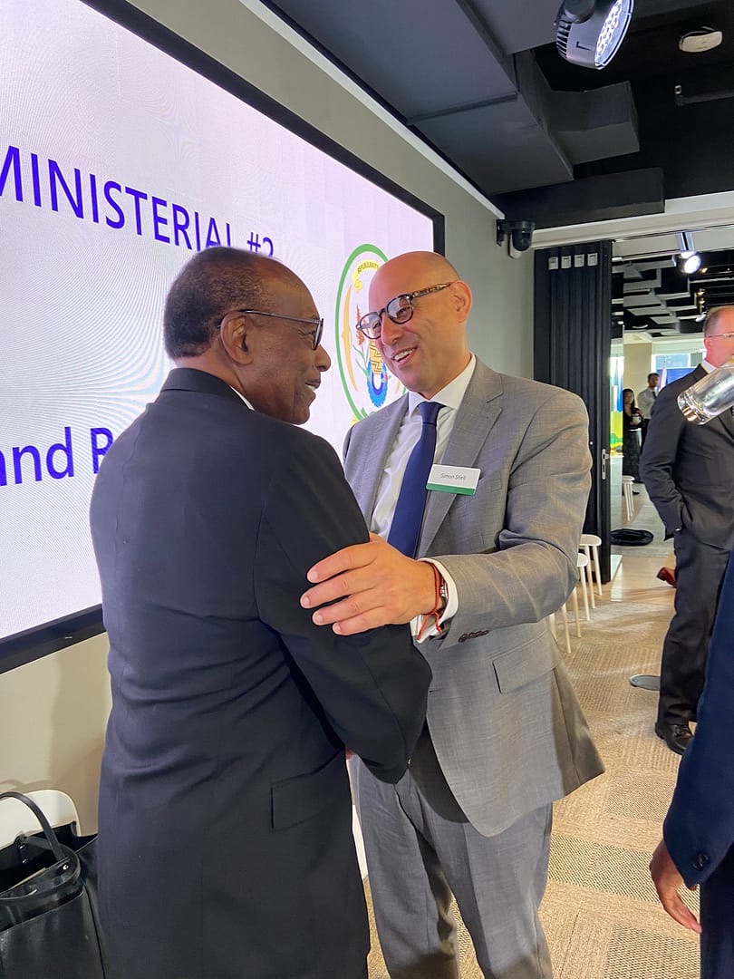 Sir Molwyn Joseph in conversation with Grenadian Simon Stiell, Executive Secretary of the UNFCCC