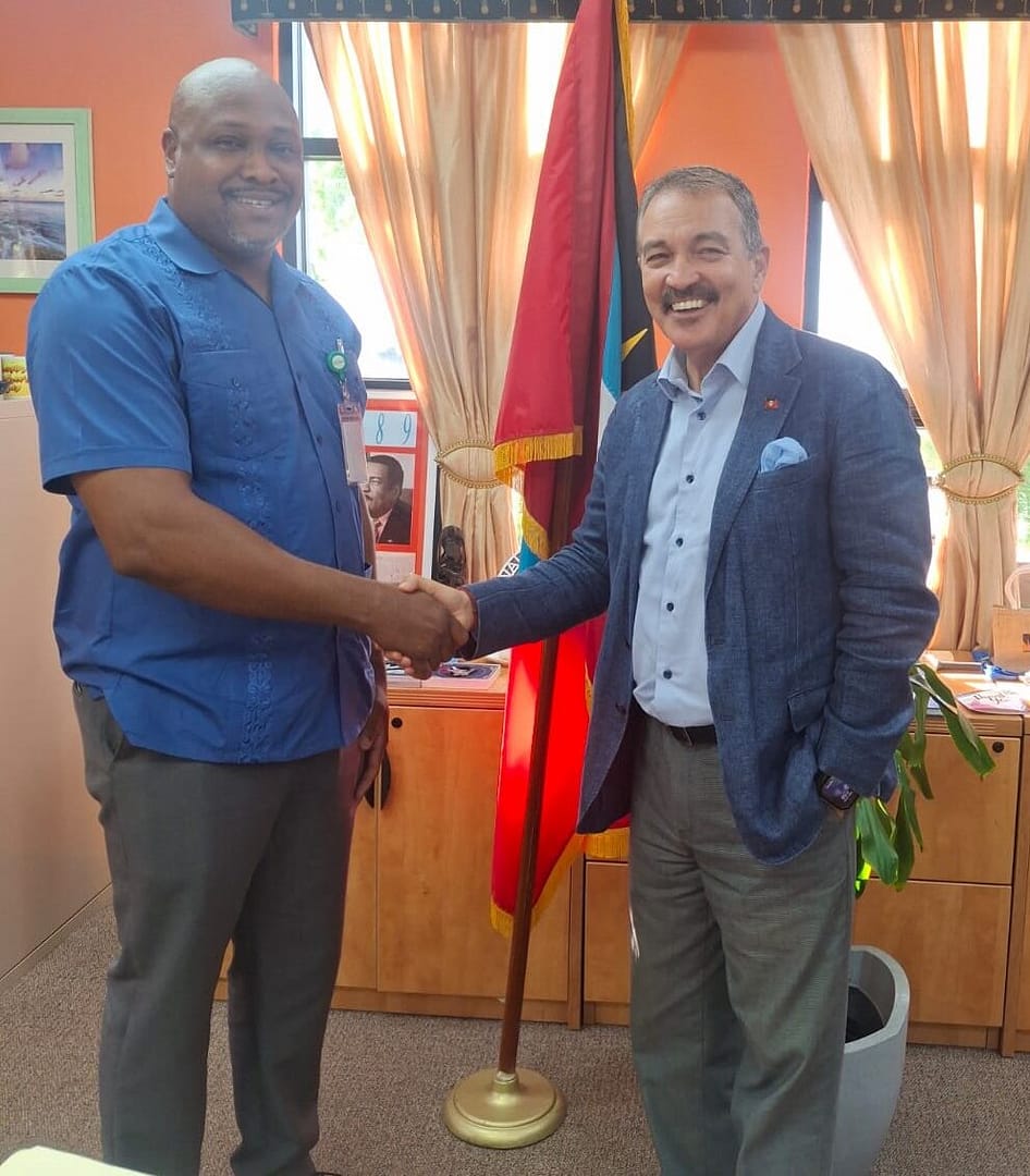 ABAA's Operations Manager, Rex Daly with Minister H. Charles Fernandez