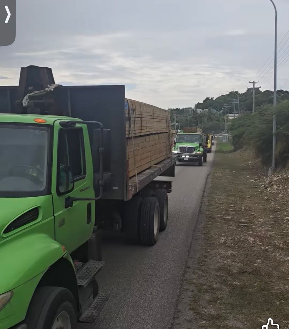 VIDEO: Truckloads of building materials arrive for distribution to needy households