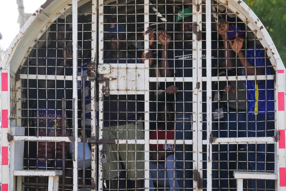 DEPORT HAITIANS
