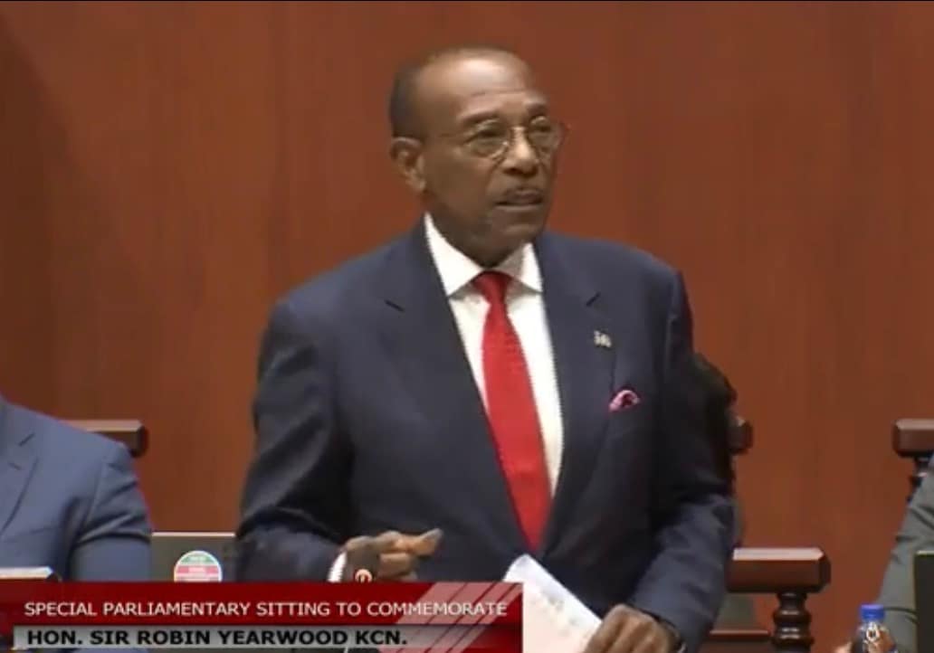 Sir Molwyn Urges End to Divisive Politics During Tribute to Sir Robin