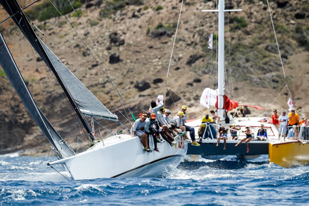 Antigua Sailing Week Expands Shoreside Experience With Riddim & Tides Beach Celebration. 